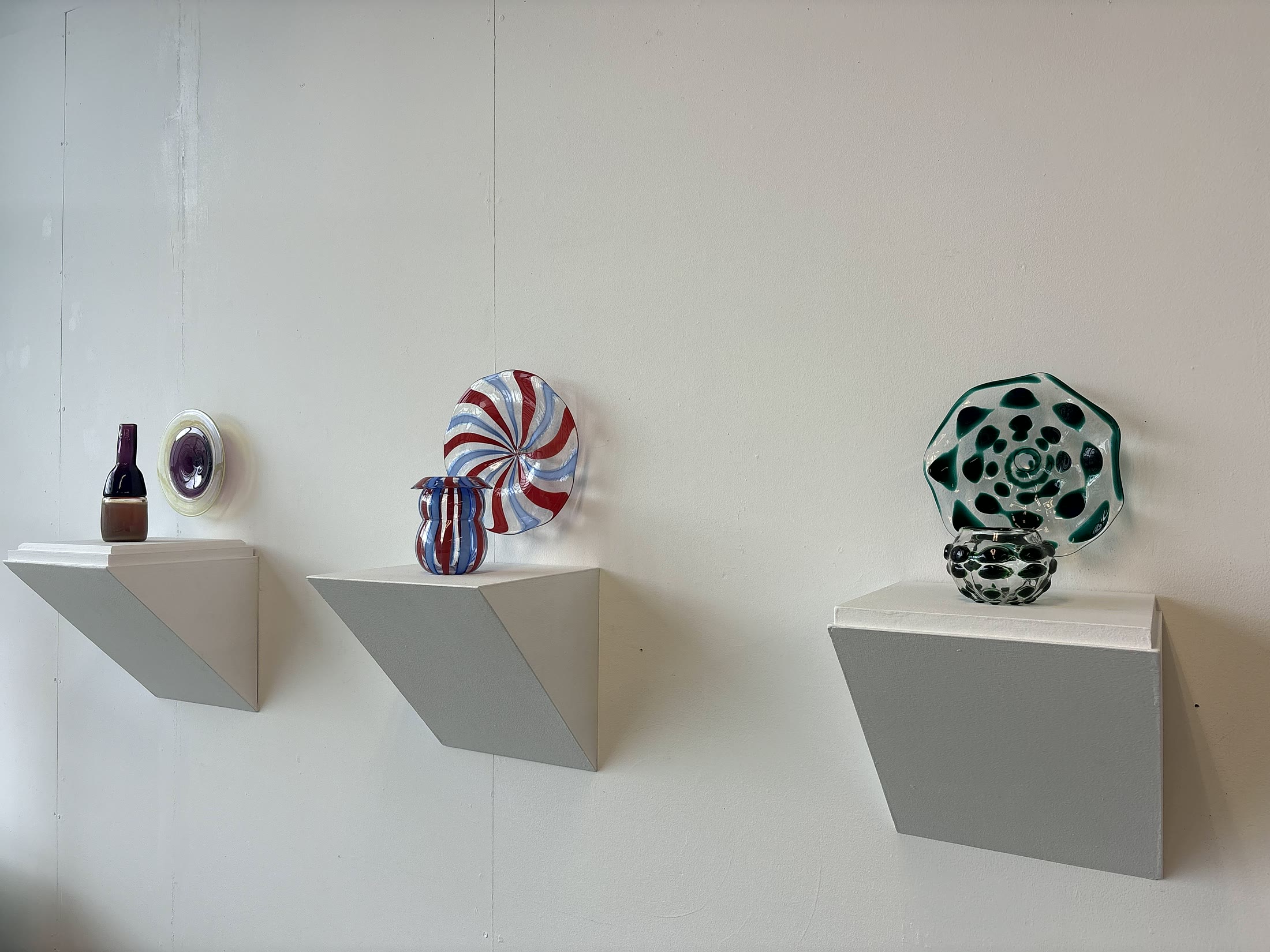 Gallery installation of Caroline Abbey glass works for showroom storytelling